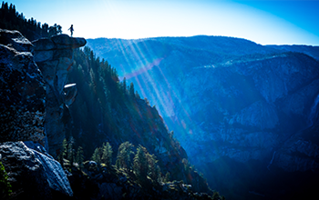 Mountains with blue sky and sun